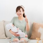 産後骨盤矯正で身体を整えて育児が楽になって笑顔の女性